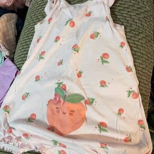 Adorable peach jumper can be worn both ways